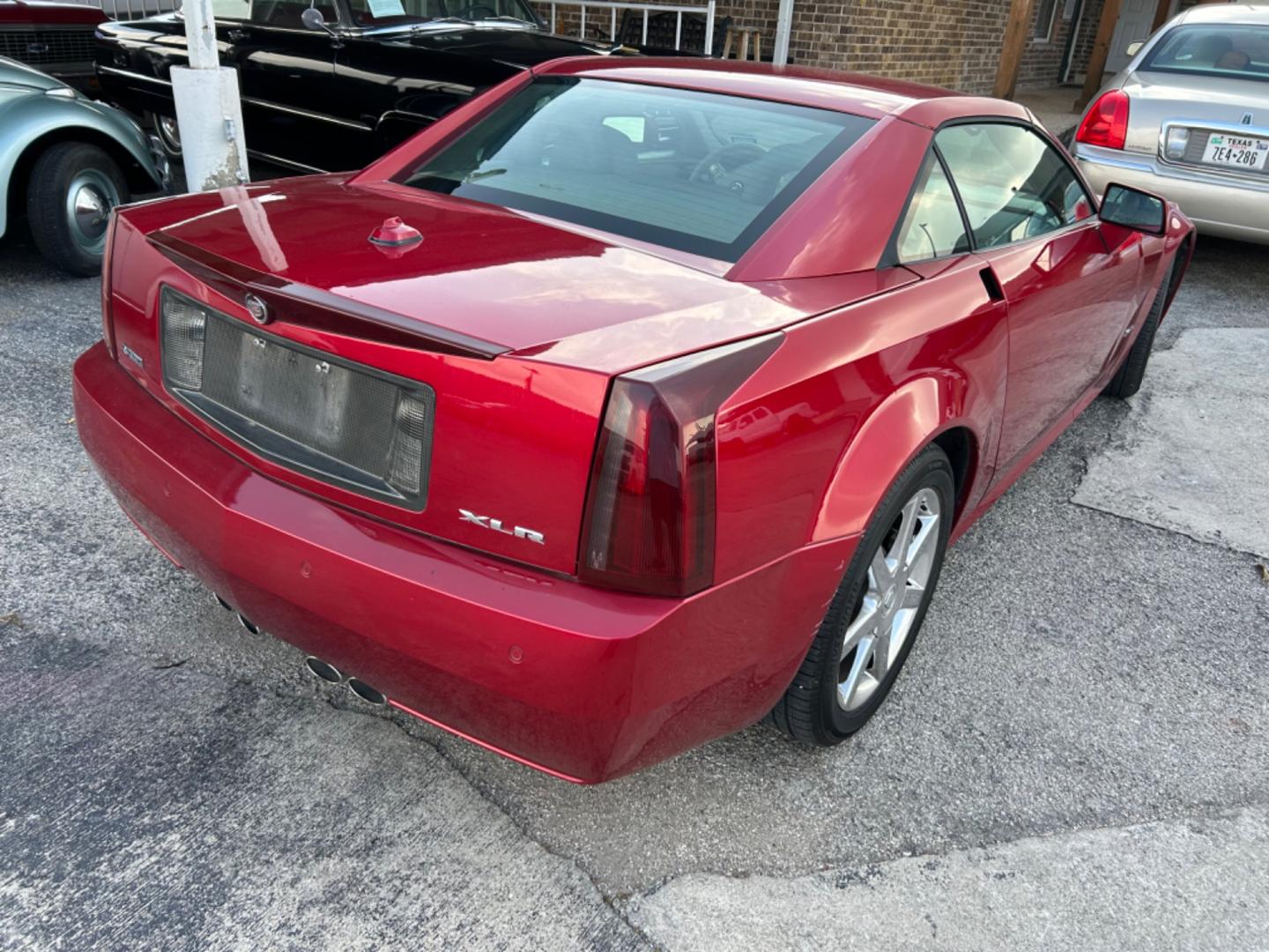 2005 Red Cadillac XLR Convertible (1G6YV34A355) with an 4.6L V8 DOHC 24V engine, 5-Speed Automatic Overdrive transmission, located at 1687 Business 35 S, New Braunfels, TX, 78130, (830) 625-7159, 29.655487, -98.051491 - Photo#4